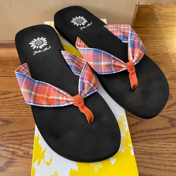 yellow box orange flip flops